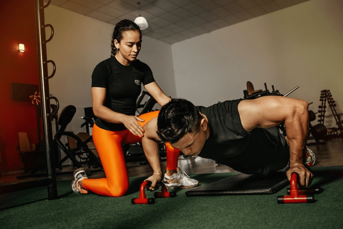 Image of a woman training a client